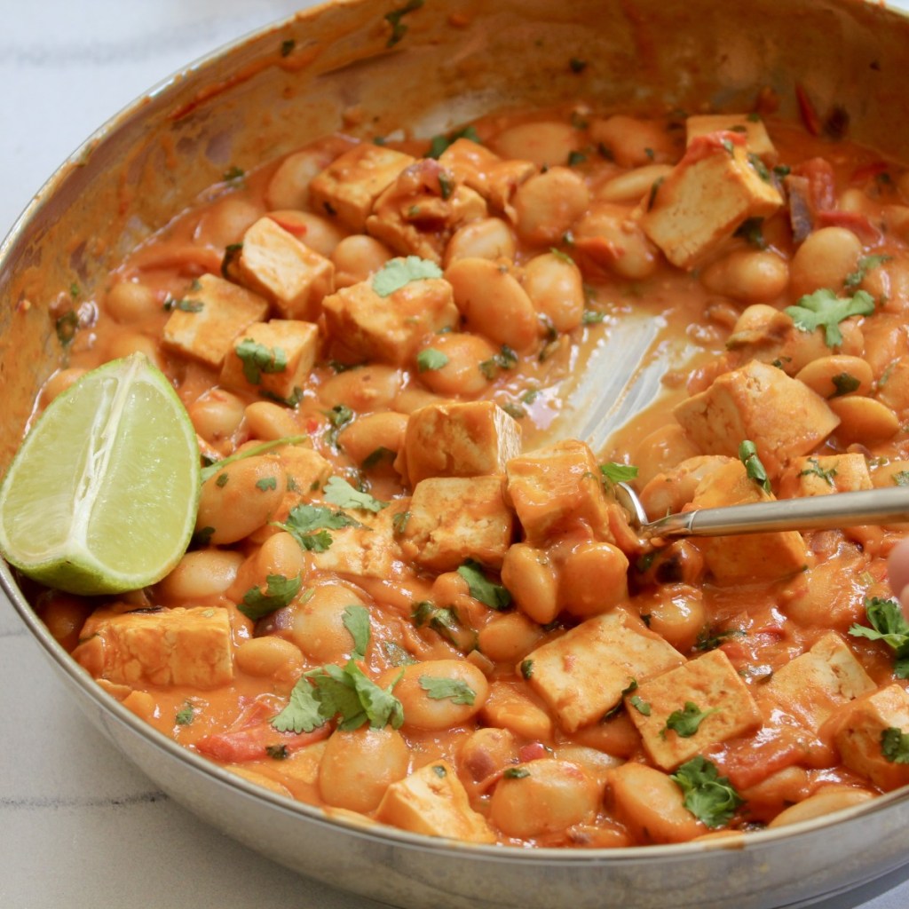 square image of creamy gochujang butter beans with tofu